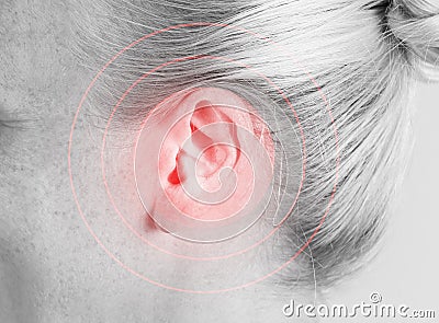 Mature woman suffering from earache. Black and white tone Stock Photo