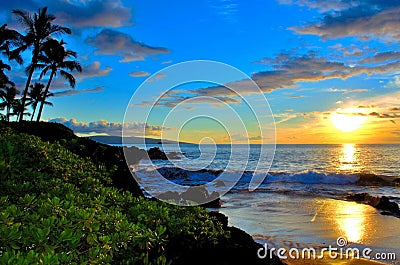 Maui Hawaii Beach Sunset with palm trees Stock Photo