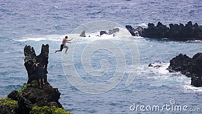 A Cliff Jumper at Waianapanapa State Park, Maui, Hawaii Editorial Stock Photo