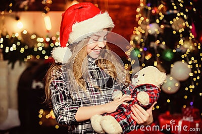 May all your days be happy and bright. New year holiady. Little girl in red hat. Holiday shopping. Christmas time. New Stock Photo