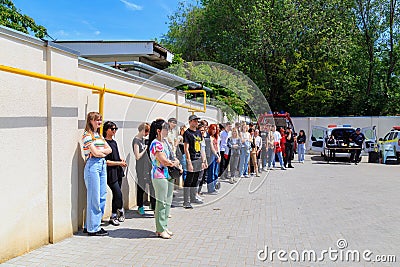 May 25, 2022 Beltsy Moldova. Illustrative editorial background. Police and schoolchildren at a joint security exercise Editorial Stock Photo