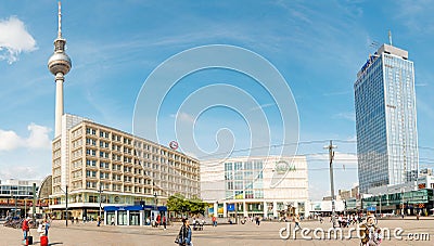 Panoramic view of Alexanderplatz square with famous TV tower and crowds of people Editorial Stock Photo