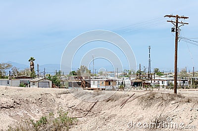 BOMBAY BEACH, CA: Abandoned trailers and homes in Bombay Beach, California, near the Salton Sea Editorial Stock Photo