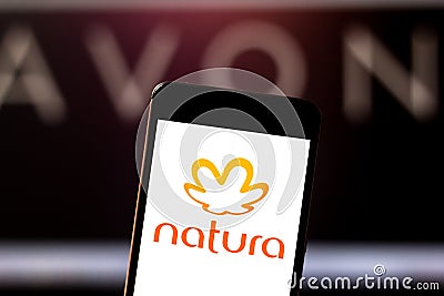 May 22, 2019, Brazil. In this photo illustration the Natura logo is displayed on a smartphone Cartoon Illustration