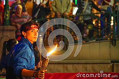 19 May 2019 Eskisehir Turkey. Young boy holding fire torch that symbolises the independence of Turkish nation on 19 May National Editorial Stock Photo