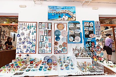 Greek ceramics and other souvenirs for sale at the streets of old town of Lindos. Greek traditional Editorial Stock Photo