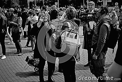 May 24 2020 Minsk Belarus. Virus mask mature woman standing wearing face protection in prevention for coronavirus in Belarus Editorial Stock Photo