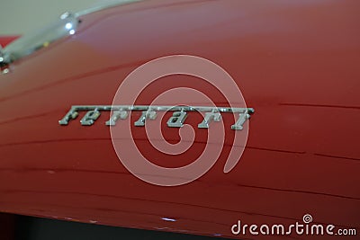 May 2022 Modena, Italy: Ferrari logo icon close-up on red car. details of the sportscar Editorial Stock Photo