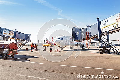 Airplaine of Russia Airlines in the process of maintainance and service near the Editorial Stock Photo