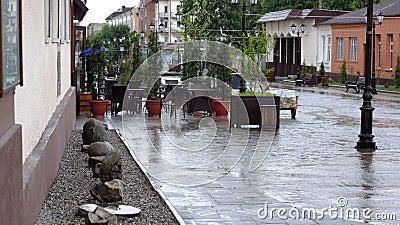 May rain in the pedestrian street of Nalchik. Stock Photo