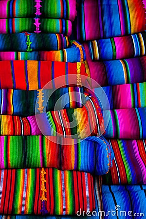 Mayan blankets textile designs on the market in Chichicastenango Guatemala Stock Photo