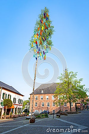 Maypole on the square of a german town Editorial Stock Photo