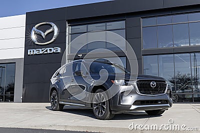 Mazda CX-90 PHEV display at a dealership. Mazda offers the CX-90 in Turbo Select, Preferred, Plus or Premium models Editorial Stock Photo