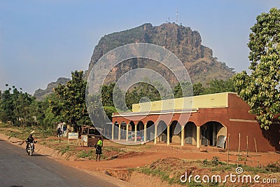 Everyday life on the street of the local Ugandan border town of Mbale near the border with Kenya. View of Mount Elgon, East Africa Editorial Stock Photo