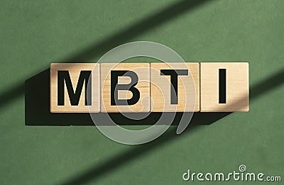 MBTI word on wood cubes on green background Stock Photo