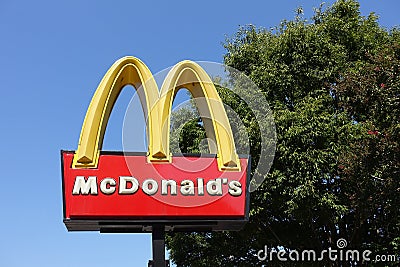 McDonald`s Golden Arches Signage Outside the Fast Food Restaurant Editorial Stock Photo