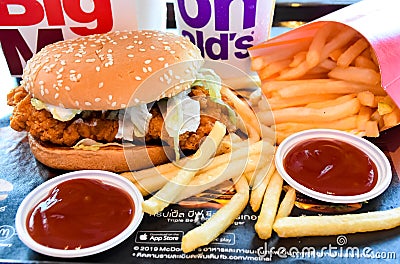 McDonald`s Large Fried Chicken Hamburger Menu + French Fries and Coke Drinks Editorial Stock Photo