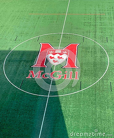 McGill university logo on the lawn of Percival Molson Memorial stadium in Montreal, Quebec Canada Editorial Stock Photo