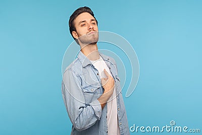 This is me! Portrait of selfish narcissistic man in worker denim shirt pointing himself and looking with pride Stock Photo