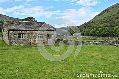 Meadows, Barns and Drystone Walls in Upper Swaledale, Yorkshire Dales, North Yorkshire, England, UK Stock Photo