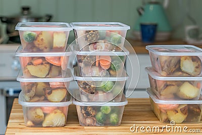 Meal prep. Stack of home cooked roast dinners Stock Photo