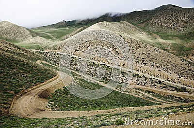 Meandering high mountain roads at Upper Mustang, Nepal Stock Photo