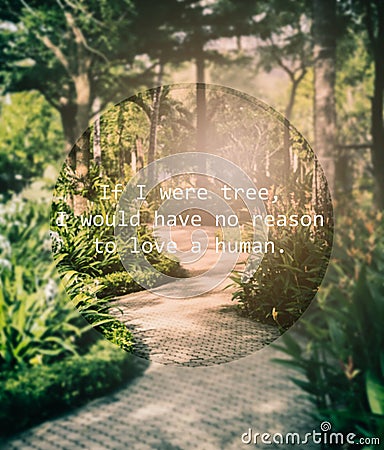 Meaningful quote on blurred garden background Stock Photo