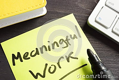 Meaningful Work written on a memo stick. Stock Photo