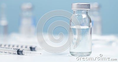 Medicines, needle syringe drug, medical Vaccine vial on a white background with copyspace. Vaccination and health care concept Stock Photo