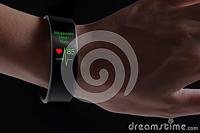 Measurate heart rate application with smart wristband. Stock Photo