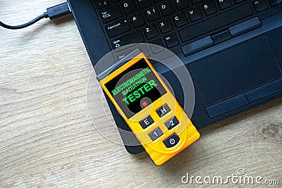 Measurement of electromagnetic radiation in the workplace at home or office . Stock Photo