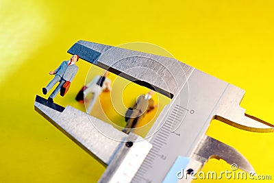 Measuring business people Stock Photo