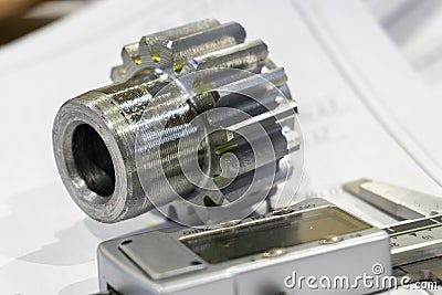Measuring gears with a caliper in production, high-precision machining Stock Photo