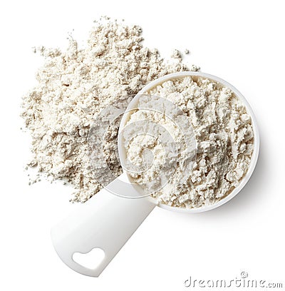 Measuring spoon and heap of vanilla protein powder Stock Photo