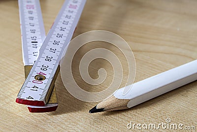 Measuring tape meter and pensil. Construction tools. Stock Photo