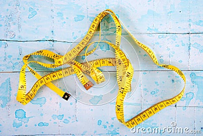 Measuring tape of the tailor for you design Stock Photo