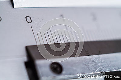 Measuring tools. Caliper close-up. Scale of division on a tool. Stock Photo