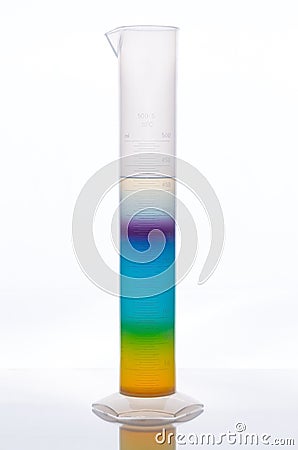 Measuring tube with multicolor liquid Stock Photo