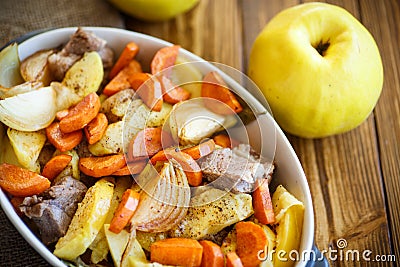 Meat baked with quince Stock Photo