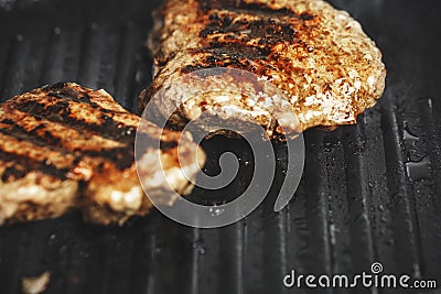 Meat with beautiful roast in pan is fried at home Stock Photo