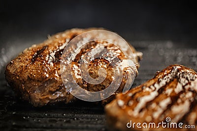 Meat with beautiful roast in pan is fried at home Stock Photo