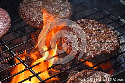 Meat burgers for hamburger grilled on flame grill Stock Photo