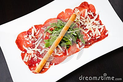 Meat carpaccio with Parmesan Stock Photo