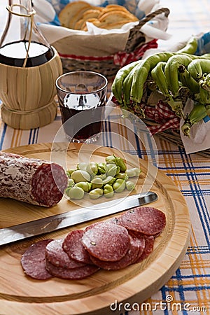 Meat chopping board of traditional Italian salami Stock Photo