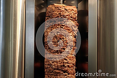 A stick of Arab shwarma in front of the grill Stock Photo