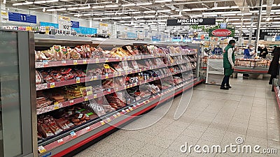 Meat delicacies on sale in the supermarket during the coronavirus epidemic Editorial Stock Photo