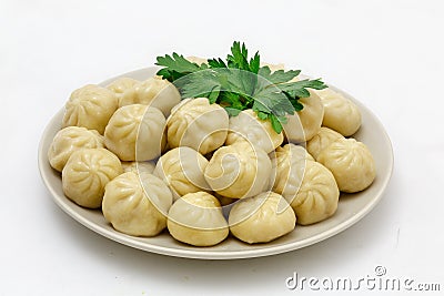 Meat dumplings - russian pelmeni, ravioli with meat on a plate, isolated Stock Photo