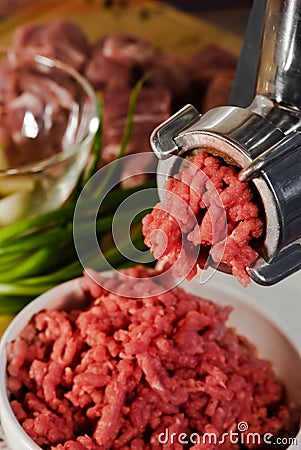 Meat grinder and mincemeat Stock Photo