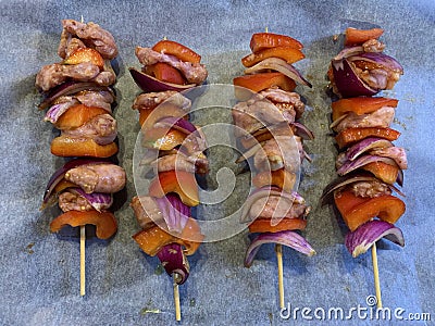 Meat kebabs on wooden skewers aerial Stock Photo