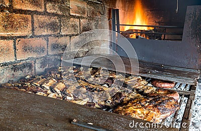 Roast meat on fire typical Latin American and Argentine food Stock Photo